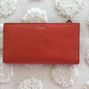 Lodis coral leather wallet and card carrier.
